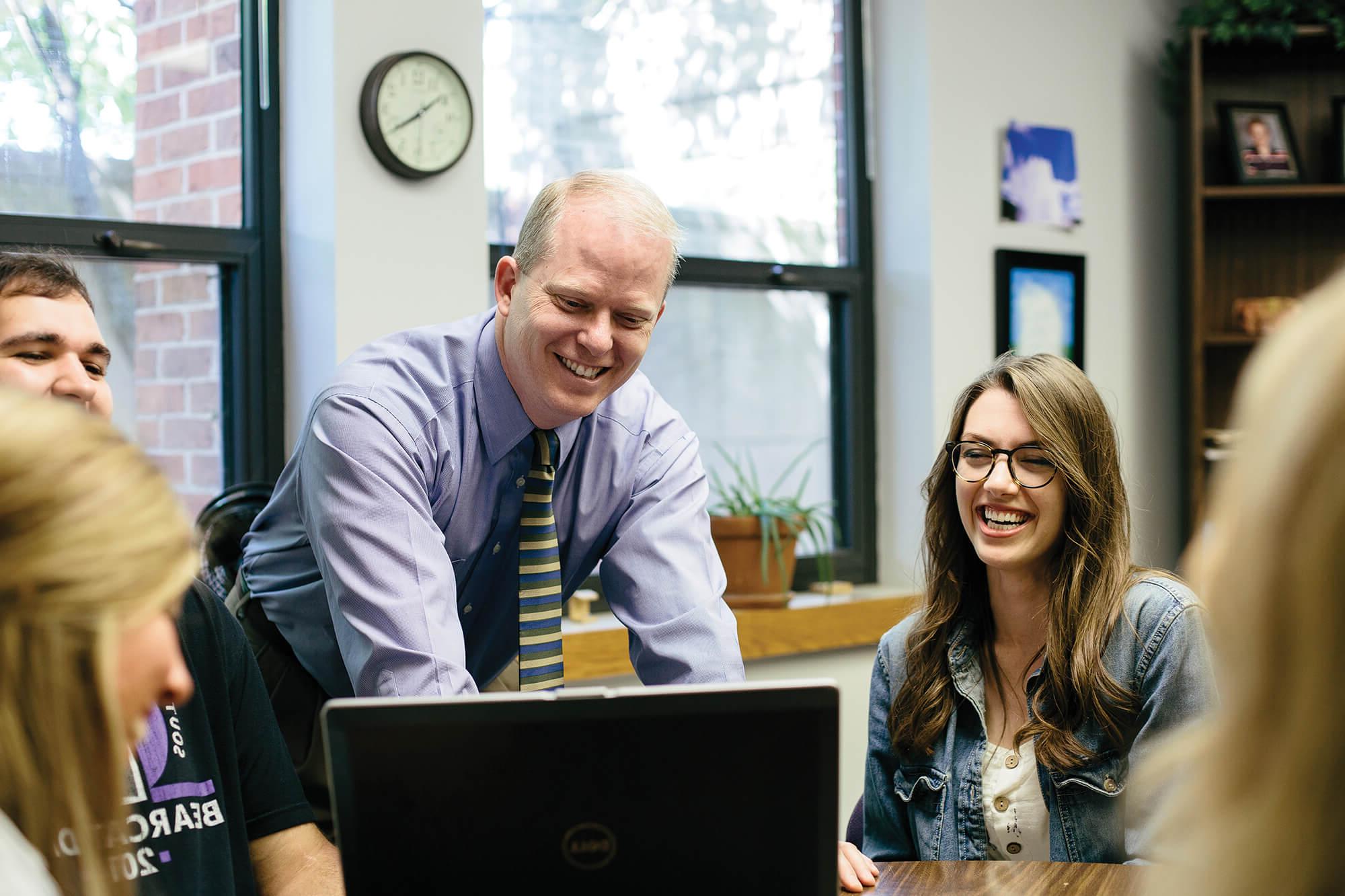 professor talking to students